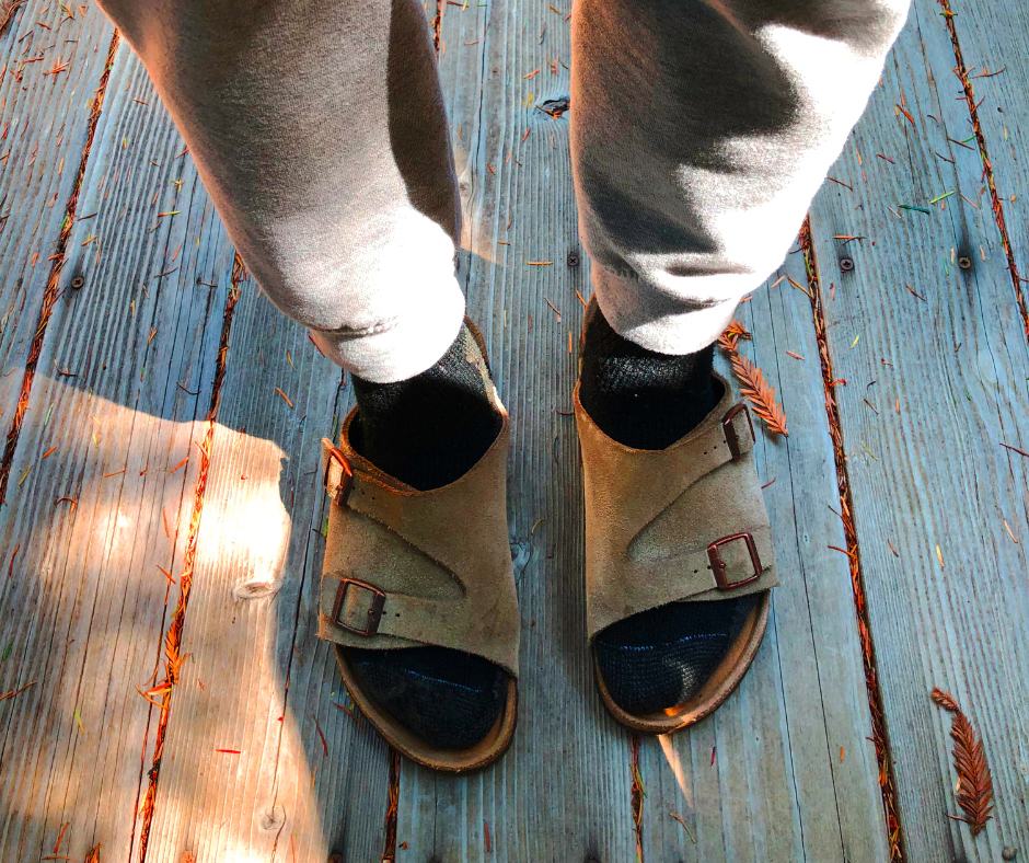 Person wearing Birkenstocks